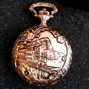 Gold train pocket watch